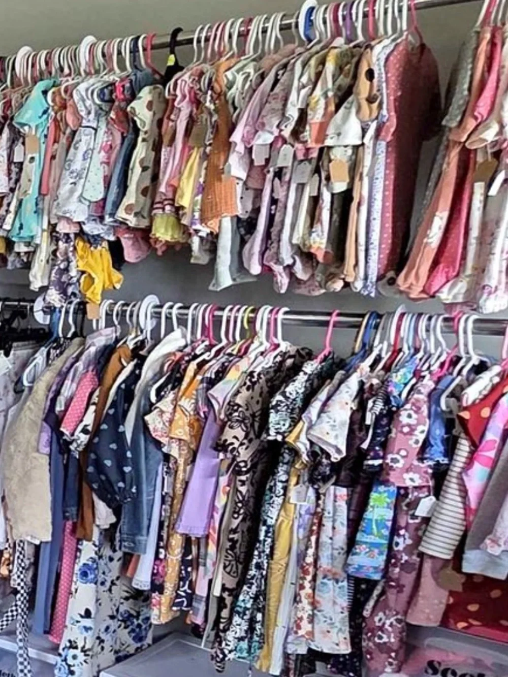 Tote of baby girls clothing